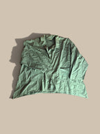 Eleven Stitch Design sage green asymmetrical snap-front pocket shacket front flat lay