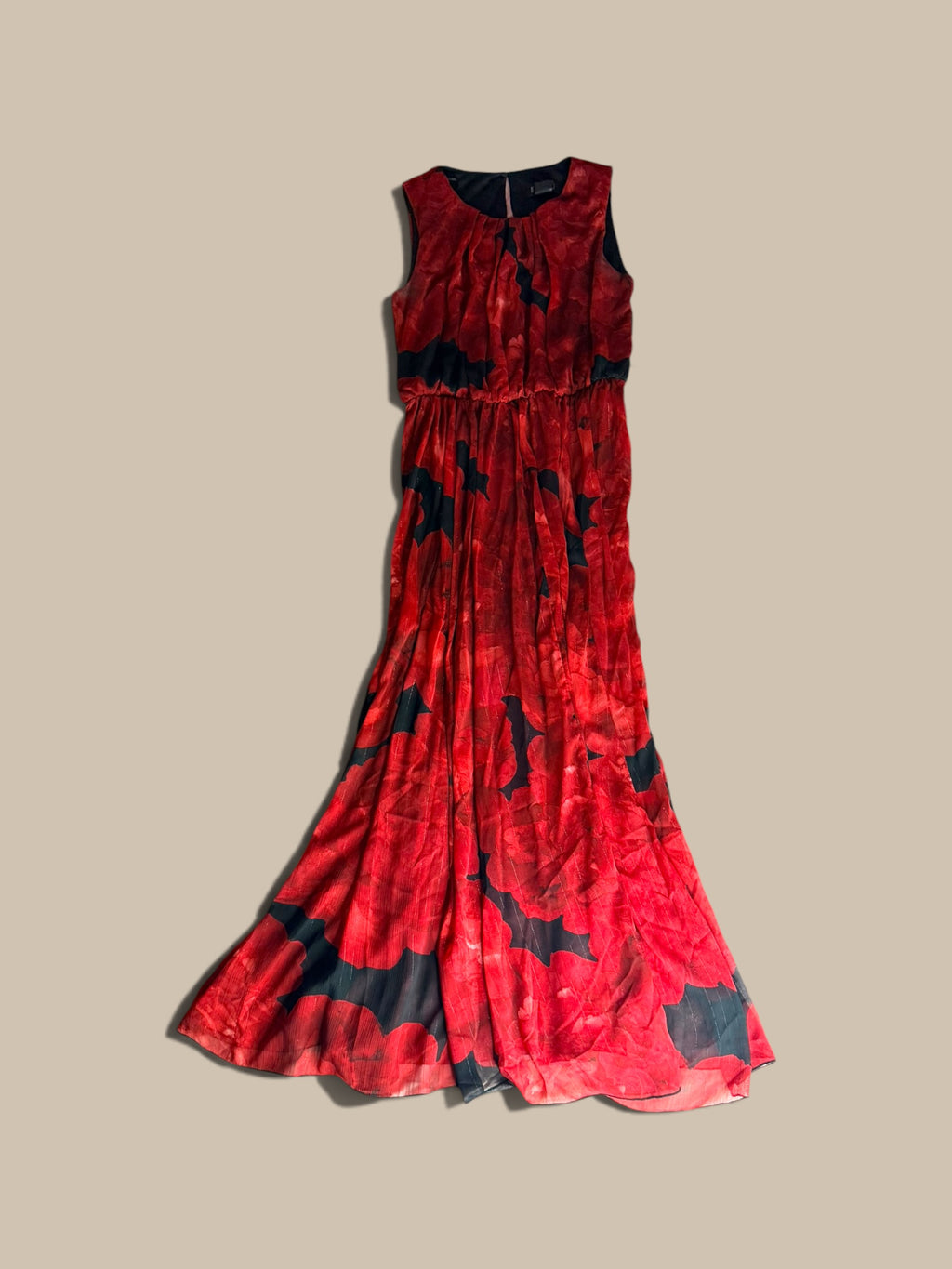 An Enfocus Petite crimson red and black abstract floral chiffon maxi dress, displayed flat against a solid beige background.