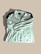 A light gray I.N.C. International Concepts faux-leather trim full-zip knit jacket with black shoulder panels, laid flat on a beige background with a soft shadow.