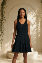 MICHAEL Michael Kors black pointelle knit dress modeled from the front