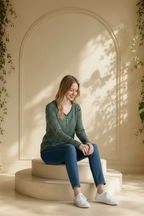 Stars Above charcoal grey and white striped Henley pajama top shown on smiling model looking down with hands in pockets